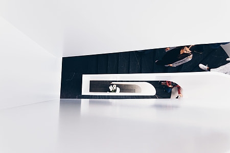 high angle photography of spiral stairs thumbnail