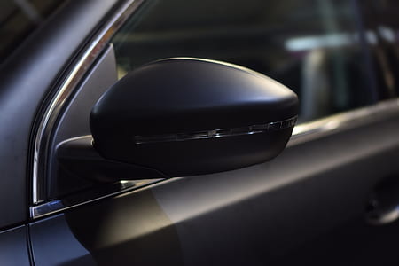 selective focus photography of vehicle side mirror thumbnail