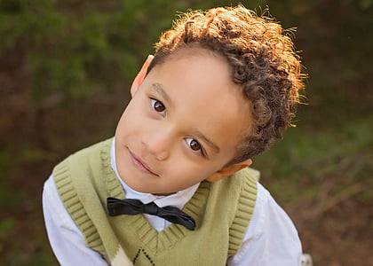 boy wearing green vest thumbnail