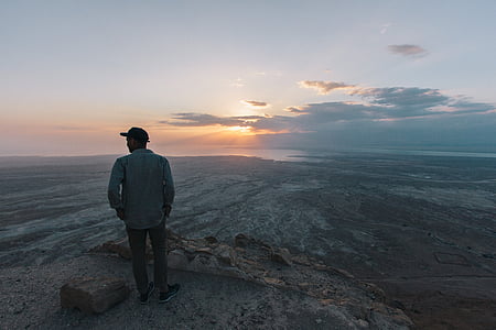 man standing on sand thumbnail