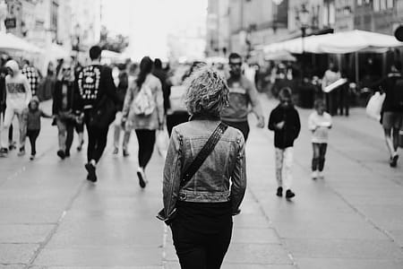 Grayscale Photo Of Woman Walking thumbnail