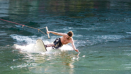 man wakeboarding on water thumbnail