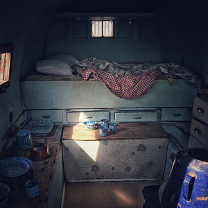 brown wooden chest near bed thumbnail