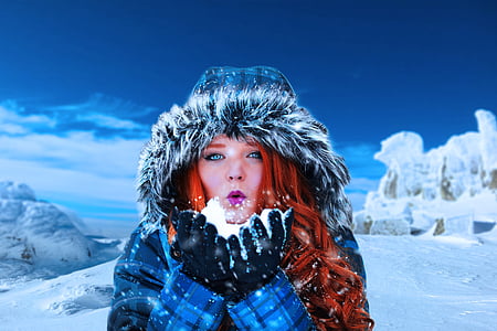 woman wearing blue and white parka jacket thumbnail