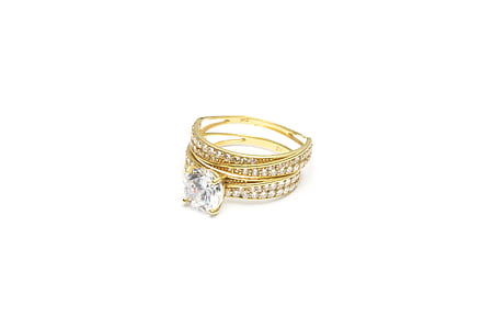 gold-colored ring with clear gemstone thumbnail