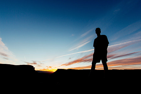 man silhouette during sunrise thumbnail
