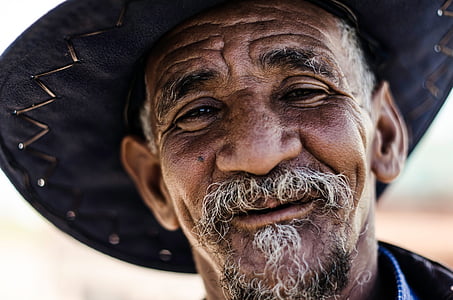 man wearing black sombrero hat thumbnail