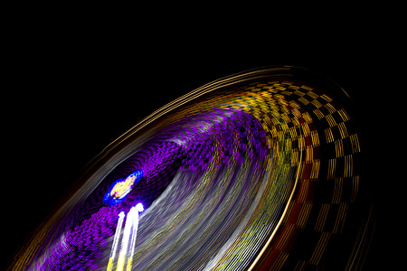 orange and black spinning lights timelapse photography thumbnail