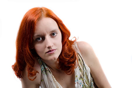 woman wearing white and multicolored sleeveless top thumbnail