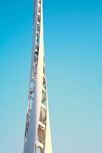 white tower under blue sky thumbnail