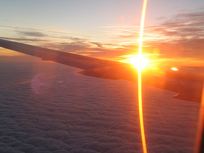 airplane above the sky under golden hour thumbnail