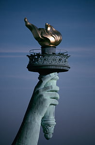 statue of liberty torch photography during daytime thumbnail
