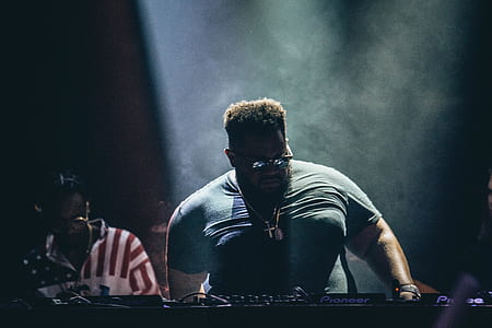 man playing turntable thumbnail