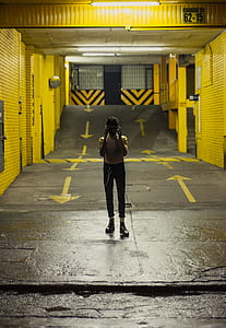 person standing in the middle of the road thumbnail
