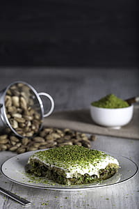 dish with cream and green herb on plate thumbnail