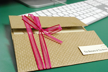brown envelope with pink ribbon thumbnail