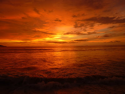 sunset on body of water thumbnail