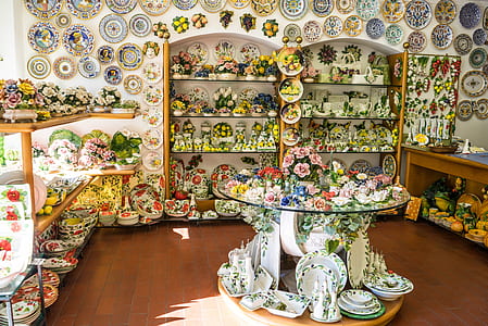 assorted decor and dinnerware lot in the room thumbnail