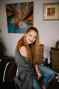 woman in black jacket smiling thumbnail