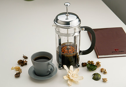 glass coffee press beside cup thumbnail