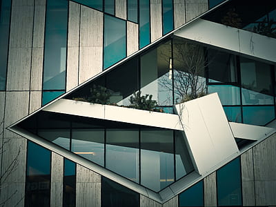 white and blue building at daytime thumbnail