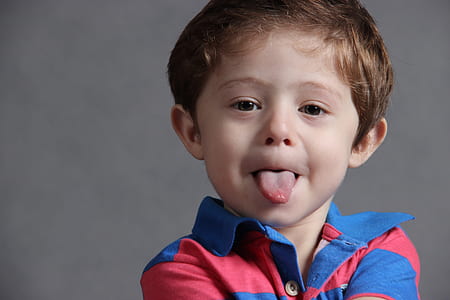photo of boy sticking tongue out thumbnail