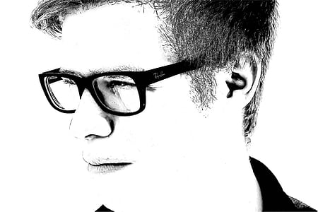 person wearing black-framed eyeglasses thumbnail