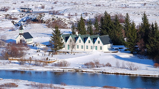 five white houses near a river in snow terrain thumbnail