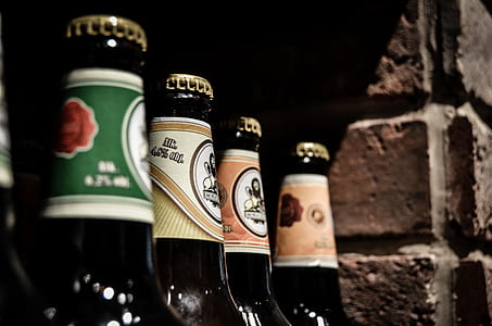 closeup photo of assorted-brands beer bottles thumbnail