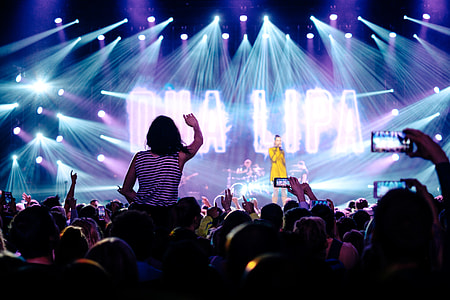 person performing on stage thumbnail