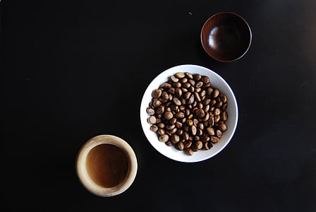 coffee beans on white ceramic bowl thumbnail