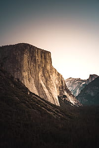 rock mountain under gray sky thumbnail