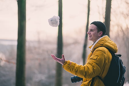 photo of man making snowball thumbnail