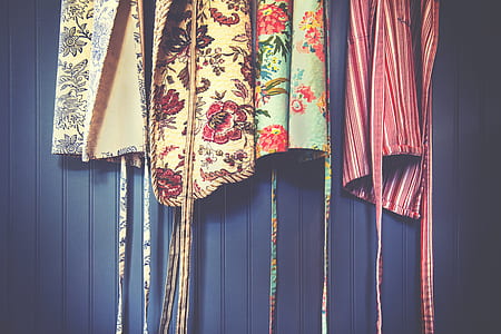 six assorted-color aprons thumbnail