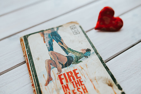 Little red heart with an old book thumbnail