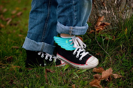 person standing on grass field thumbnail