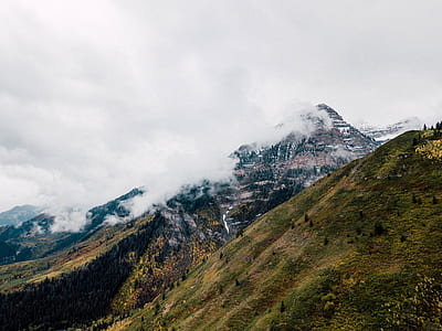 landscape photo of green hills near mountain thumbnail