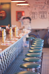 counter table with bar stool chairs selective focal photo thumbnail