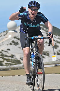man riding on bicycle during daytime thumbnail