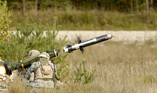 focus photo of person firing RPG during daytime thumbnail