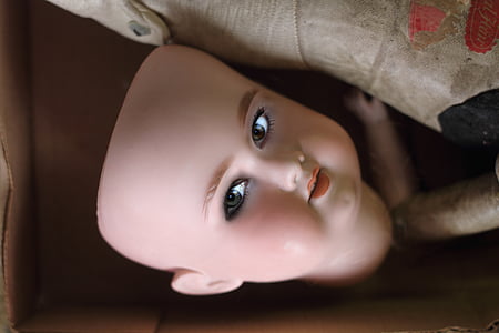 doll head in box thumbnail