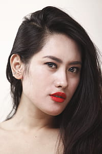 Woman With Red Lips Near White Wall thumbnail