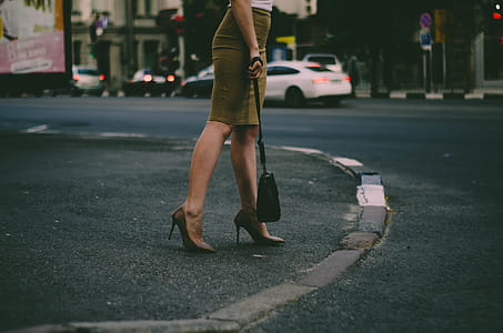 Woman's Holding Black Sling Bag thumbnail