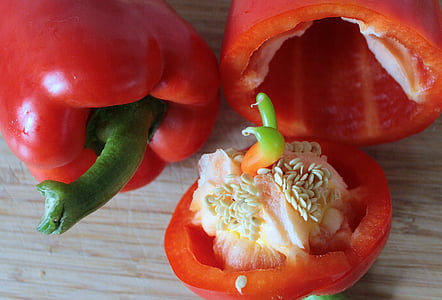 red bell peppers on brown surface thumbnail