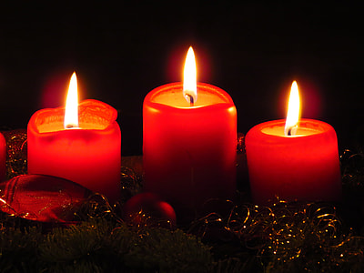 three red candles lighted thumbnail