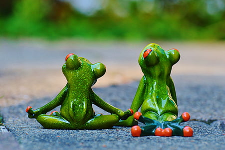 two green ceramic frog figurines thumbnail