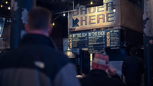 man near order here corner at nighttime thumbnail