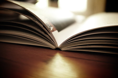opened book on table thumbnail