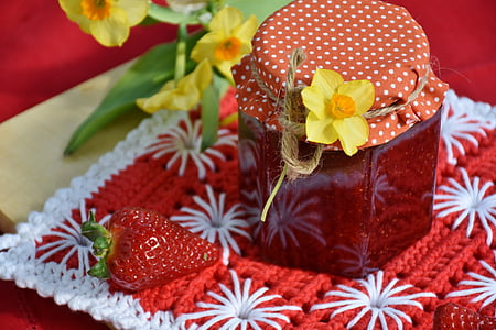 closeup photo of sealed red glass jar thumbnail