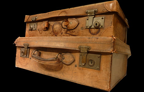 two pilling brown leather suitcases thumbnail